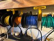 a bunch of wires and wires on a shelf